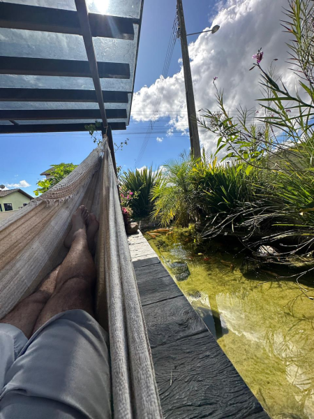 CASA COM PISCINA E LAGO DE CARPAS EM FORQUILHINHA